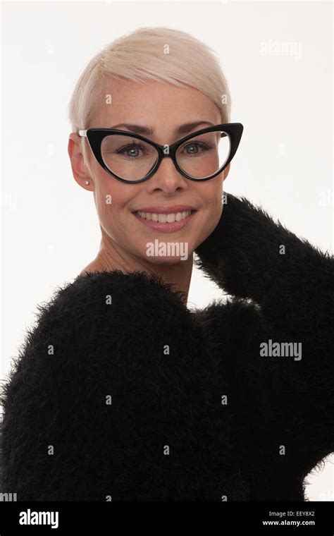 Mature Woman Wearing Big Glasses With Short Blonde Hair