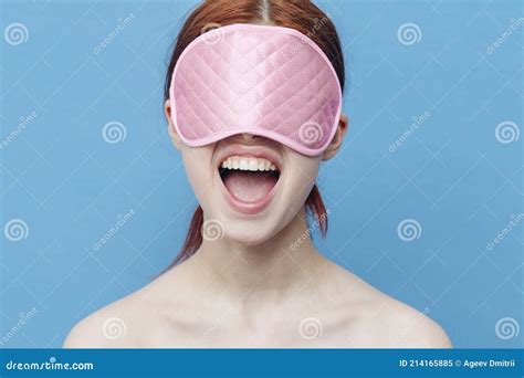 Emotional Woman With Pink Sleep Mask On Her Face And Blue Background Model Stock Image Image