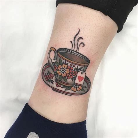 A Traditional Cup Of Tea Tattoo Inked On The Calf Teacup Tattoo