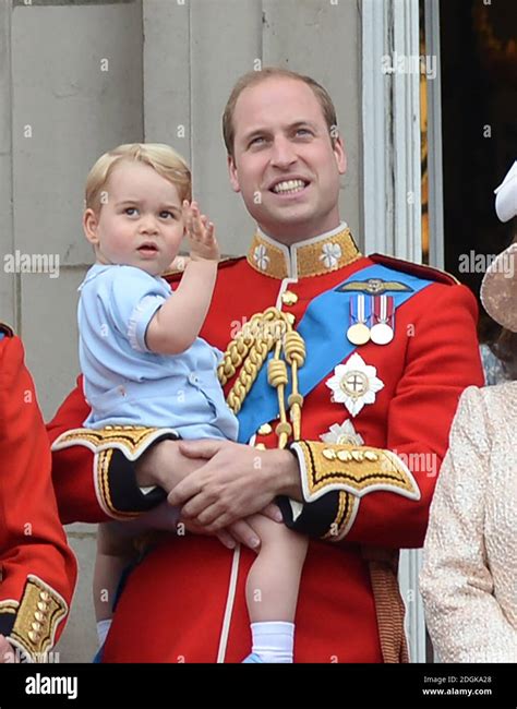 Prince George In The Arms Of His Father Prince William Duke Of
