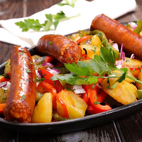 Recette Saucisses de poulet et légumes au four