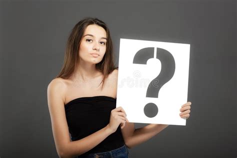 Brunette Girl Holding A Question Mark Sign Stock Image Image Of