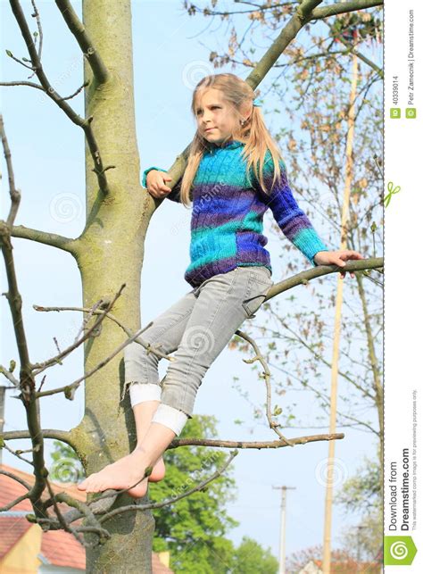 Little Kid Girl Sitting On Tree Stock Photo Image 40339014