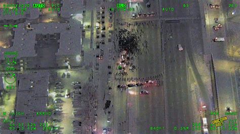 Helicopter Footage From Mass Arrest Reveals State Trooper Surveillance