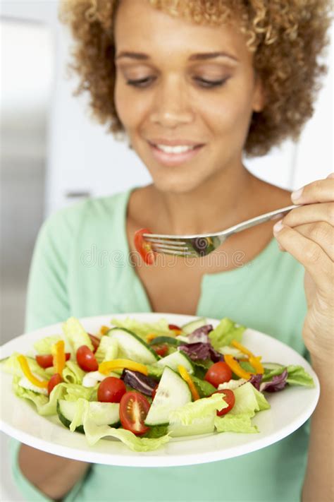 Mid Adult Woman Eating a Healthy Salad Stock Image - Image of plate ...