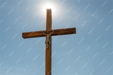 Premium Photo | An old wooden catholic cross against the background of