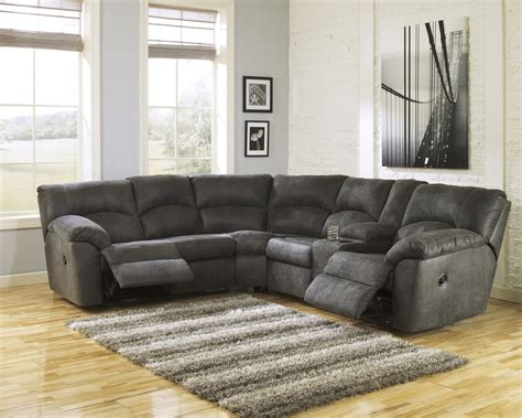 With plush cushions and angled pillow top arms, this sectional takes comfort to a whole new level. Tambo Reclining Sectional in Pewter