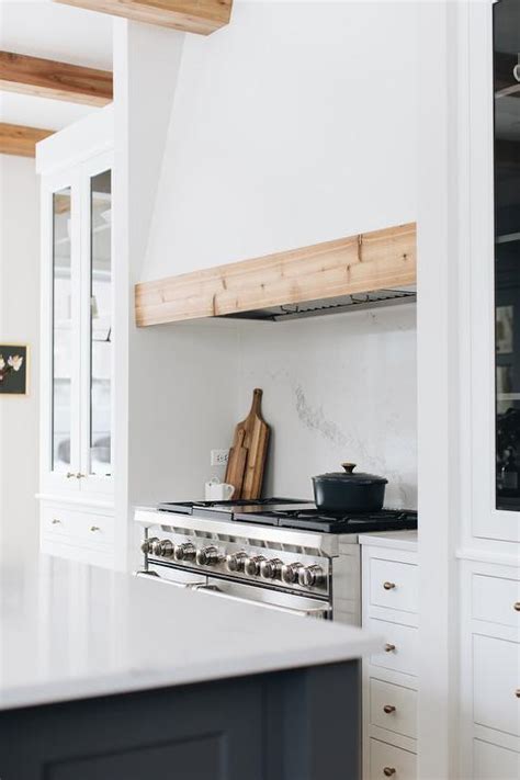 White Range Hood With Rustic Wood Trim Cottage Kitchen