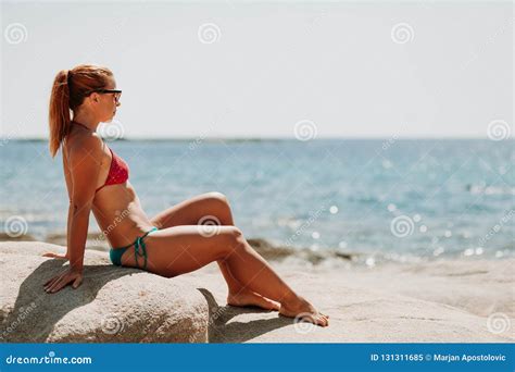 Young Woman Tanning On The Beach Stock Image Image Of Alone Lying 131311685