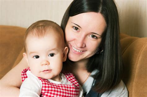 Mother breast feeding baby stock image. Image of home - 23903613