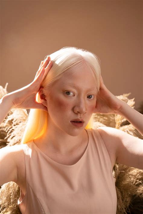 Free A Young Beautiful Albino Female Model With White Hair Posing
