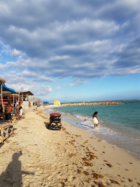 Beach And Shacks By The Ocean Under The Skies In Kingston Jamaica