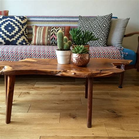 Wood feet with felt pads to protect wood floors. Raw Edge Coffee Table Furniture | Roy Home Design