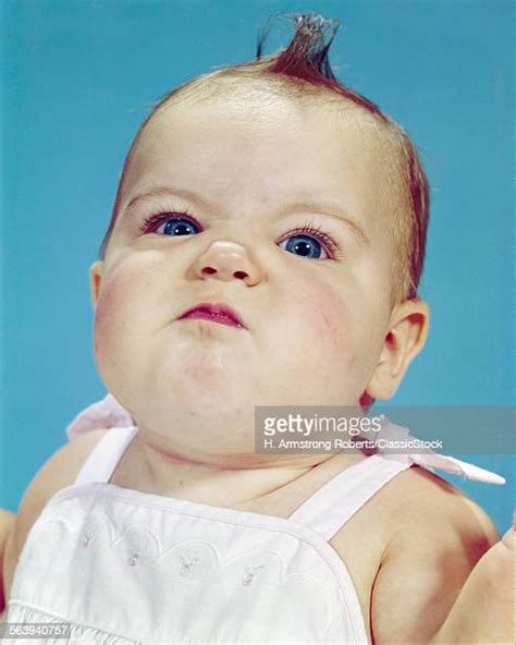 Baby Facial Expression Photos And Premium High Res Pictures Getty Images