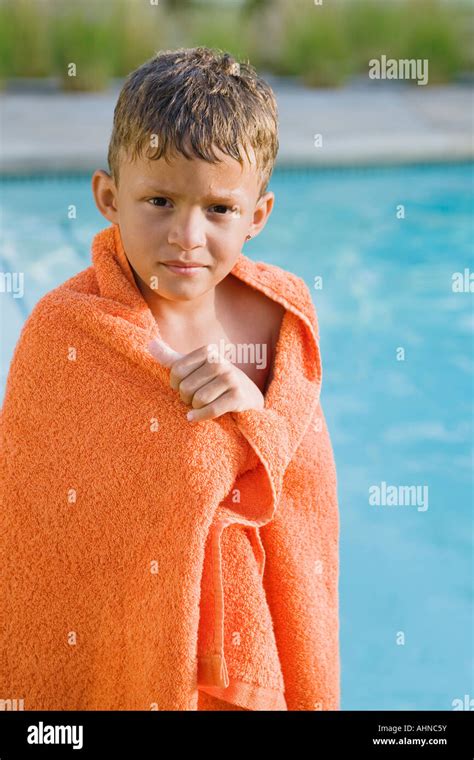 Young Boy Wrapped In Towel Stock Photo Alamy