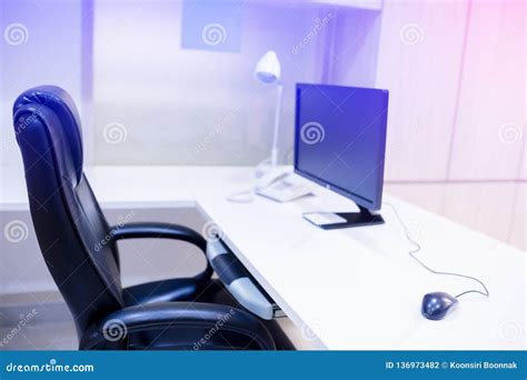 The Computer Is On The Table In A Bright Interior Stock Photo Image