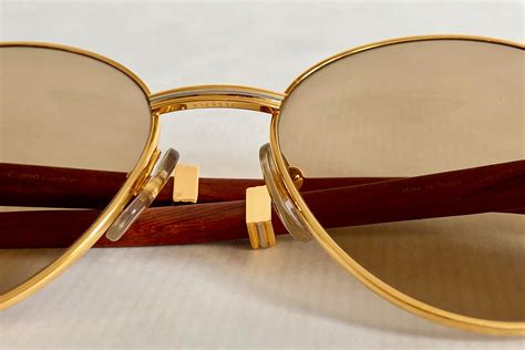 cartier bagatelle 22k gold vintage sunglasses precious wood new old stock full set 1990