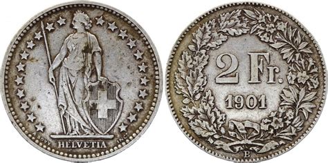 A cette période le franc suisse avait atteint son plus haut face à l'euro vous auriez avec 100 francs suisses reçu dans un bureau de change 94.1930 euros. Pièce Suisse 2 Francs Helvetia - 1901 B