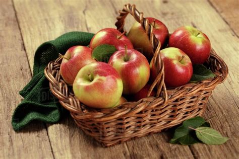 Several Braeburn Apples In A Basket Stock Photo Dissolve