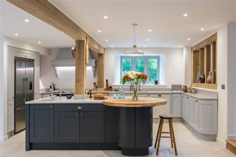 Price and stock could change after publish date, and we may make money from these links. Shaker style kitchen in graphite & light grey with light quartz worktop & oak - Farmhouse ...