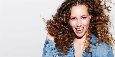 If it's volume you're after, fluff the hair with your fingers without raking through it. Naturally Curly Hair: How to Care for Your Curls | Matrix