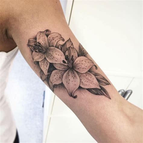 24 Symbolic Lily Tattoo Ideas Lillies Tattoo Lily Flower Tattoos