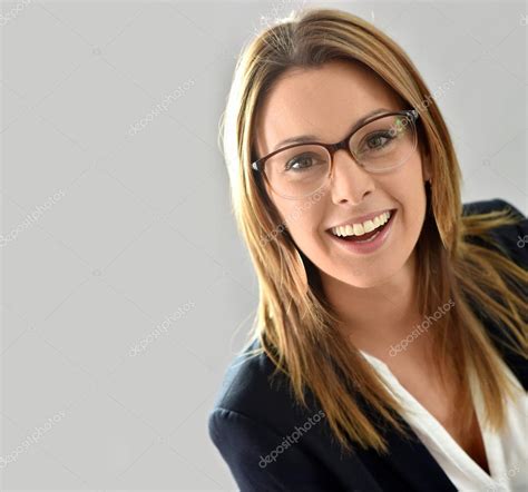 Beautiful Woman Wearing Eyeglasses Stock Photo By ©goodluz 99876844