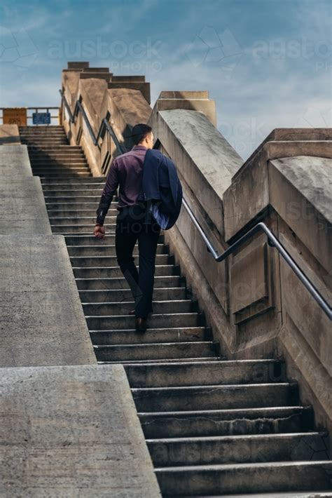 Image Of Young Man On Stairs Austockphoto