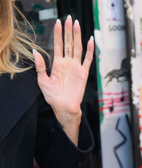 Angelina Jolie S Mysterious Middle Finger Tattoo Revealed