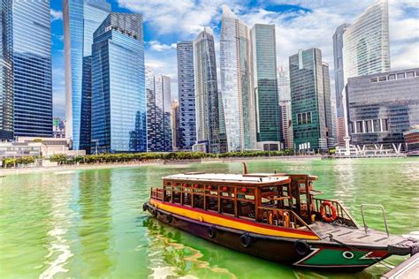 Take A Boat Ride On Marina Bay While Viewing The Skyscrapers In The