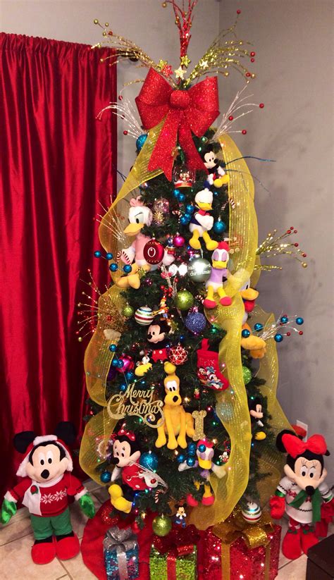 Want all your neighbors — and everyone who drives by — to know about your love for disney? christmas tree decorations Ideas | Mickey mouse christmas ...