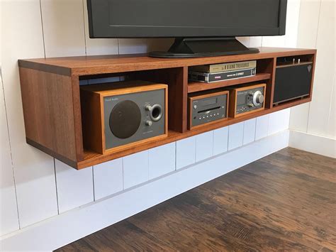 Xactmatch av wall mounts are designed to take the guesswork out of ordering and installing screen mounts regardless of the make or model of screen. Solid mahogany floating media console. Wall mounted tv and ...