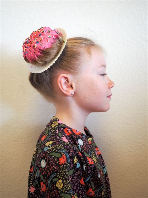 To make a donut bun with a tube sock, first cut off the toe and roll the top edge down into a donut shape. comicsfancompanion: The Amazing donut hair bun sprinkles ...