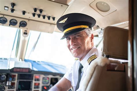 Portrait Of Airplane Pilot Looking Over Shoulder In A Private Jet Stock ...