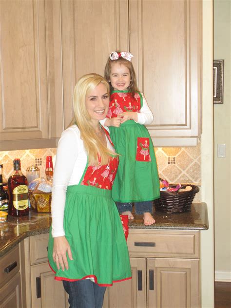 Retro Apron Mommy And Daughter Wearing Their Retro Revival Christmas Hostess Aprons Available
