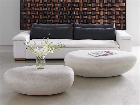 Choosing the right round coffee table can be a challenge. Phillips Collection River Stone Roman 42'' Wide Oval ...
