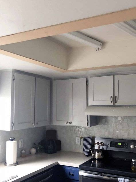 The fan is used to circulate air. Replace Your Dated Lightbox | Kitchen ceiling lights ...
