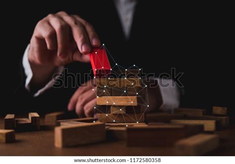 Business Man Try Build Wood Block Stock Photo Edit Now 1172580358