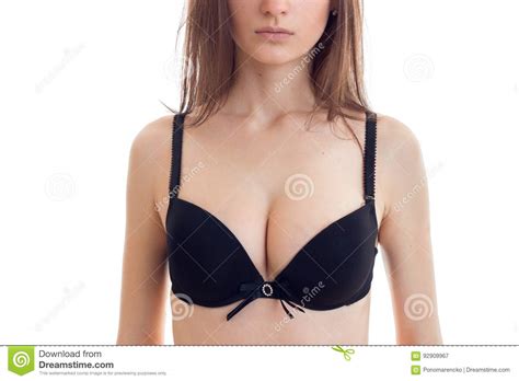 młoda dziewczyna z dużymi plciowymi naturalnymi piersiami w czarnym bielizny zakończeniu obraz