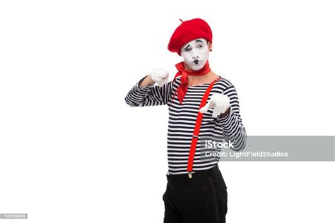 Grimacing Mime Pointing On Camera Isolated On White Stock Photo