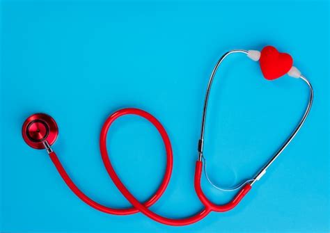 Premium Photo Red Heart And A Stethoscope On White Background