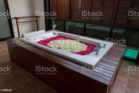 A Relaxing Bath With Rose Bath Tub With Floating Petals Rose Petals Put