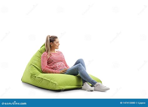 Young Casual Woman Sitting On A Bean Bag Stock Photo Image Of