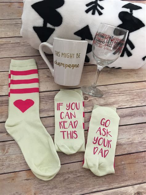 While you may be focused on finding the perfect valentine's day gift for you partner, sisters or bff, you can't forget about ma. Wine socks, Valentine's Day gift, cute heart socks ...