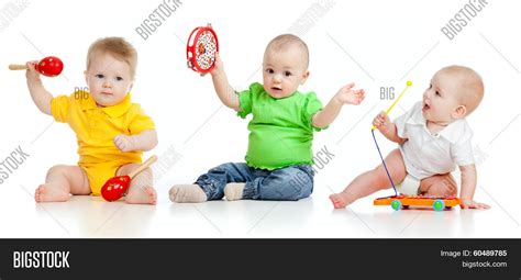 Babies Play Musical Image And Photo Free Trial Bigstock