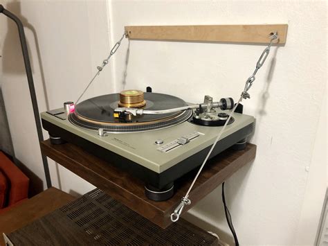 I was on the hunt for a couple months for the perfect stand to compliment it. DIY Record Player Wall Shelf : audiophile