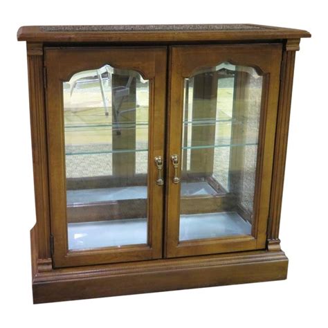 Versailles collection 61153 54 curio cabinet with 2 glass doors, 3 glass shelves, 1 drawer, arched top, touch interior lighting. 1970s Traditional Lighted Two Door Curio Console Cabinet ...