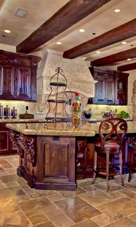 This large, beautiful table matches the color and wood type of the other furniture in the kitchen. Tuscany Style Italian Kitchen Design Ideas 12 #Tuscandecor ...