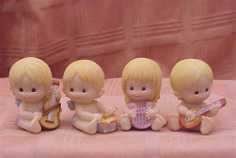 Set Of Four Baby Angels Figurines Sitting And Etsy