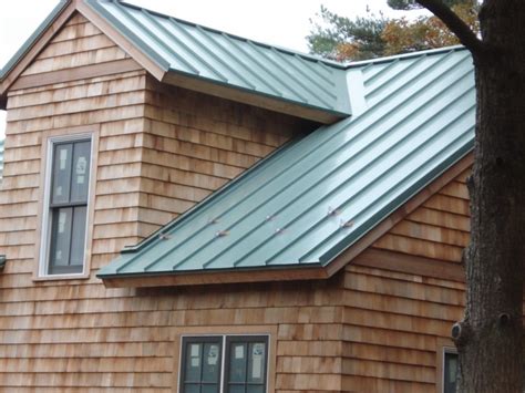 Once you've conditioned the galvanized metal to accept paint, apply. Standing Seam Metal Roof Details, Costs, Colors, and Pros ...